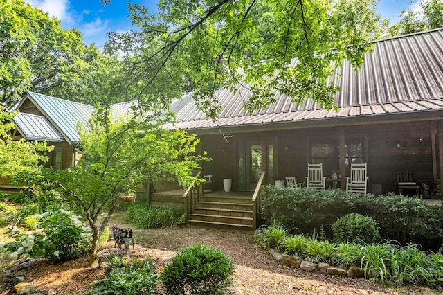 3316 Burr Rd, Springfield, TN 37172 - rear view of property featuring a metal roof and covered porch
