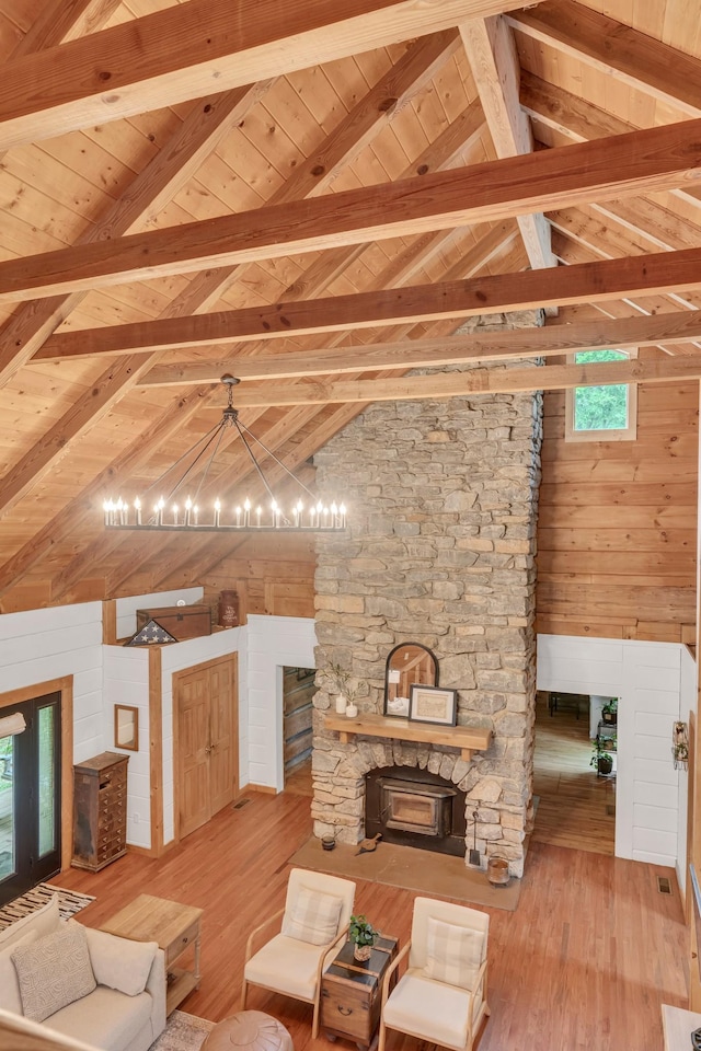 3316 Burr Rd, Springfield, TN 37172 - living room with a chandelier, hardwood / wood-style flooring, wooden walls, and wood ceiling