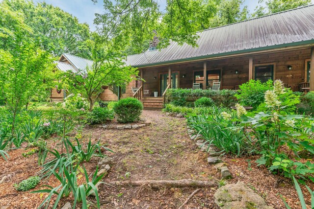 3316 Burr Rd, Springfield, TN 37172 - back of property with a metal roof and covered porch