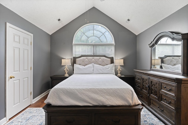525 Scotts Creek Trl, Hermitage, TN 37076 - bedroom featuring lofted ceiling, multiple windows, and wood finished floors