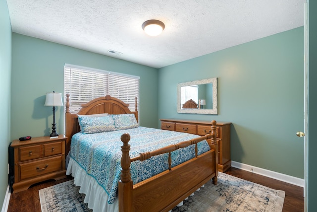 525 Scotts Creek Trl, Hermitage, TN 37076 - bedroom featuring a textured ceiling and dark wood-type flooring