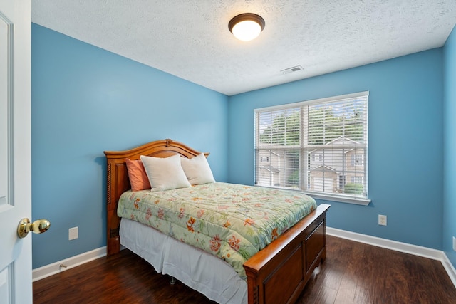525 Scotts Creek Trl, Hermitage, TN 37076 - bedroom featuring dark wood finished floors and a textured ceiling