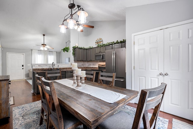 525 Scotts Creek Trl, Hermitage, TN 37076 - dining room with a ceiling fan, vaulted ceiling, and dark wood-style flooring