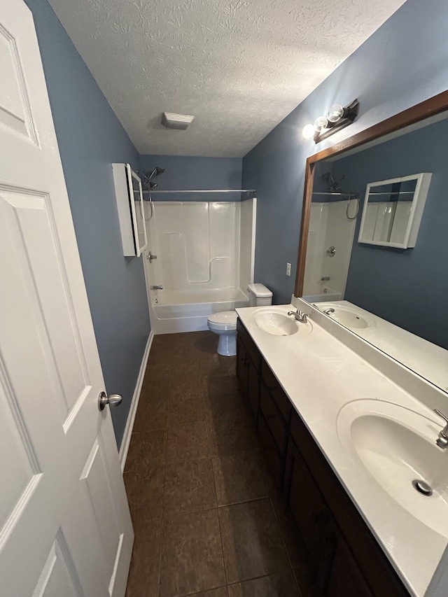 1911 Days Rd, Lafayette, TN 37083 - bathroom featuring shower / bathtub combination, double vanity, a textured ceiling, and tile patterned floors