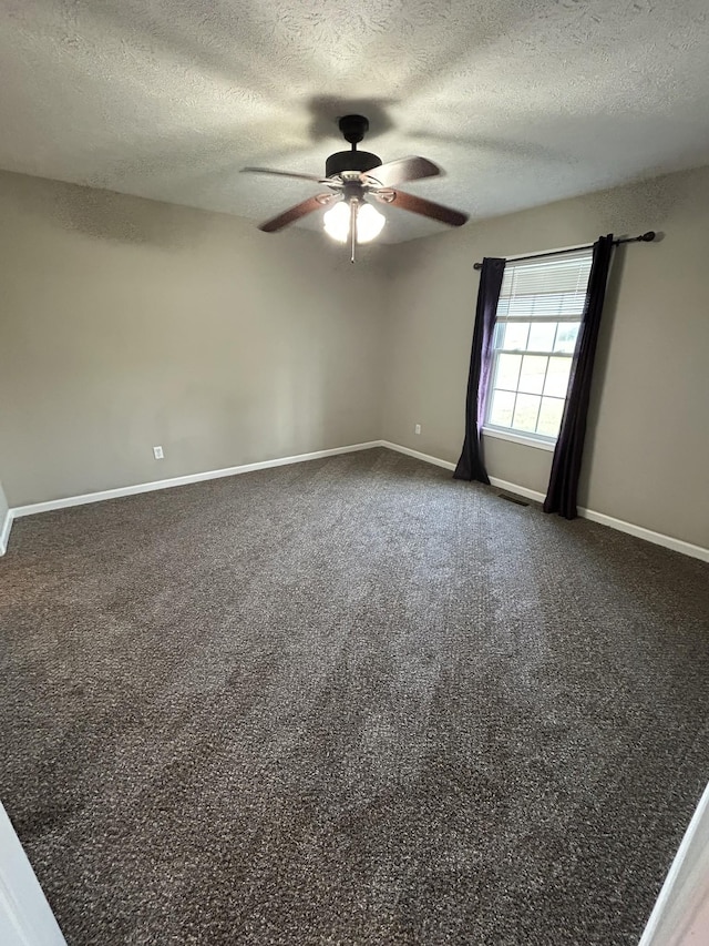 1911 Days Rd, Lafayette, TN 37083 - spare room with a ceiling fan, a textured ceiling, and carpet floors