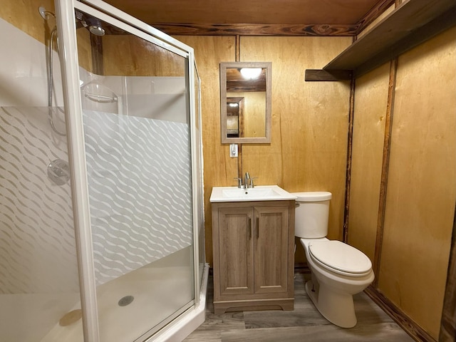 175 State Route 22a S, Jacks Creek, TN 38347 - bathroom with vanity, a shower stall, and wood finished floors