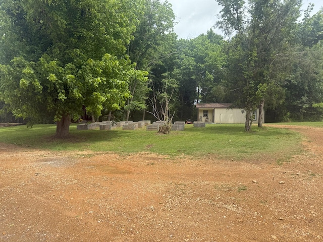 175 State Route 22a S, Jacks Creek, TN 38347 - view of green lawn featuring an outbuilding
