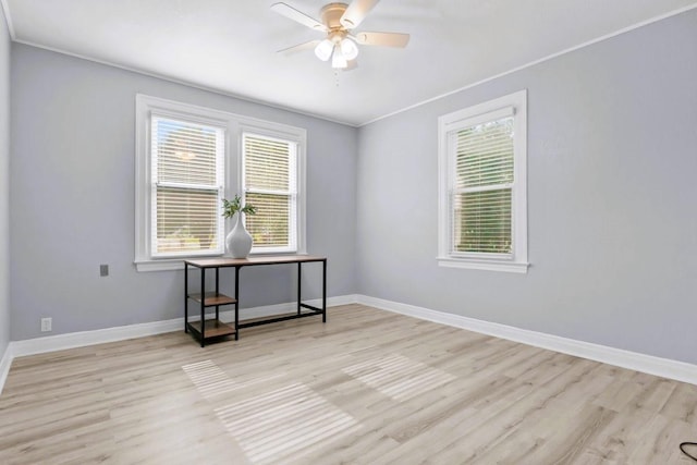 119 N Forrest Ave, Camden, TN 38320 - spare room with wood finished floors, healthy amount of natural light, ceiling fan, and crown molding