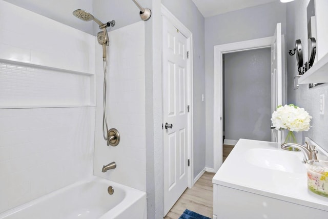 119 N Forrest Ave, Camden, TN 38320 - bathroom with shower / washtub combination, vanity, and wood finished floors