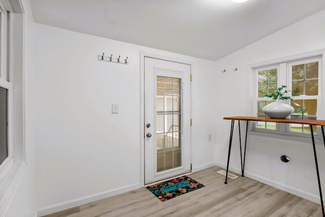119 N Forrest Ave, Camden, TN 38320 - doorway featuring light wood-style flooring and baseboards