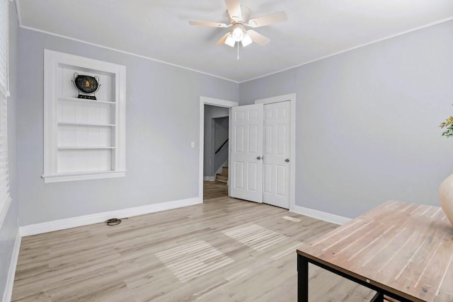 119 N Forrest Ave, Camden, TN 38320 - living area featuring ceiling fan, wood finished floors, and crown molding
