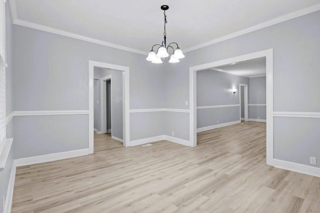 119 N Forrest Ave, Camden, TN 38320 - spare room with a chandelier, wood finished floors, and crown molding