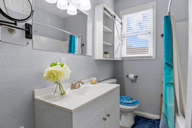 119 N Forrest Ave, Camden, TN 38320 - full bathroom with vanity, a textured wall, and shower / bath combination with curtain