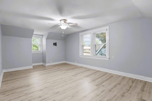 119 N Forrest Ave, Camden, TN 38320 - bonus room with vaulted ceiling, ceiling fan, light wood-style floors, and a textured ceiling
