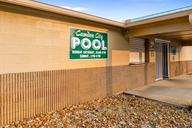 119 N Forrest Ave, Camden, TN 38320 - property entrance featuring concrete block siding