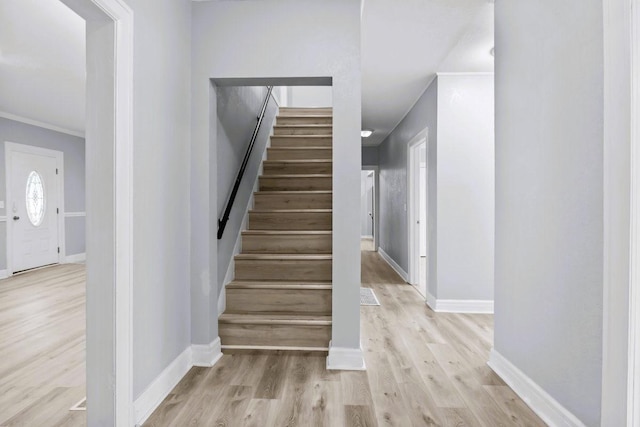 119 N Forrest Ave, Camden, TN 38320 - stairway featuring wood finished floors and ornamental molding