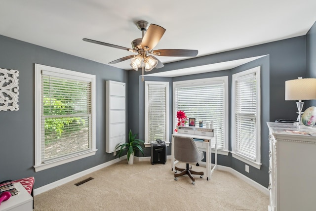 1001 Red Oak Dr, Greenbrier, TN 37073 - home office with light colored carpet, plenty of natural light, and ceiling fan