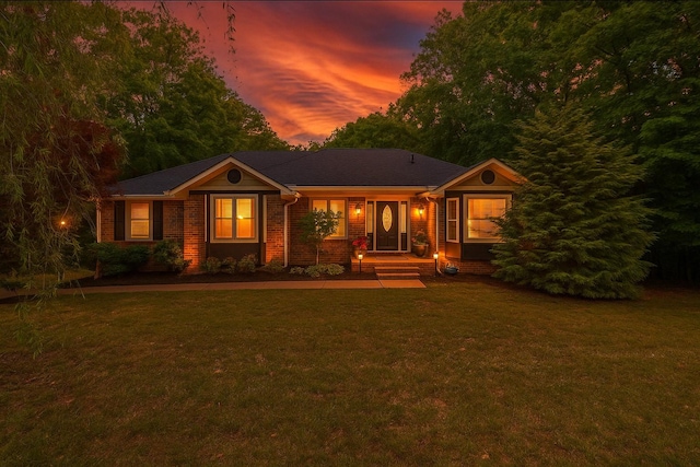 1001 Red Oak Dr, Greenbrier, TN 37073 - single story home with a lawn and brick siding