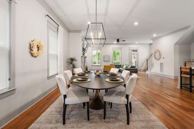 1931 Warfield Dr, Nashville, TN 37215 - dining room featuring wood finished floors, recessed lighting, ornamental molding, and stairway