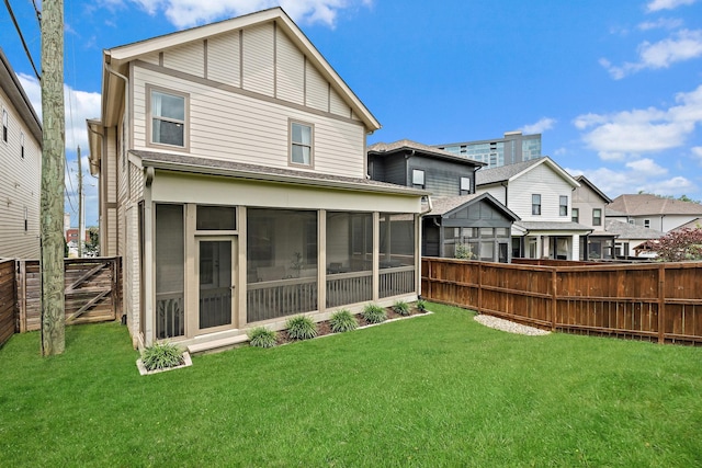 1931 Warfield Dr, Nashville, TN 37215 - rear view of house with a fenced backyard and a sunroom