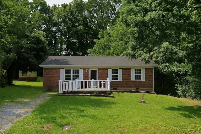 106 Hogin Rd, Dickson, TN 37055 - ranch-style house featuring brick siding and a front lawn