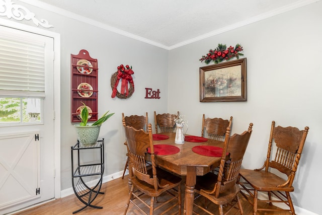 106 Hogin Rd, Dickson, TN 37055 - dining area featuring light wood-style floors and ornamental molding