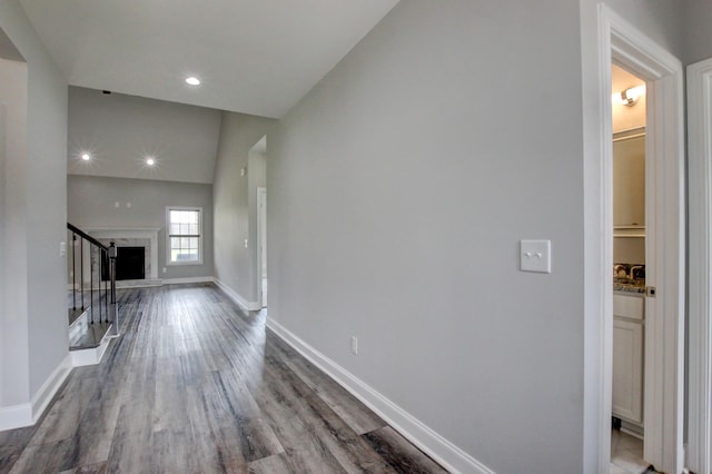 1331 Juniper Pass, Clarksville, TN 37043 - unfurnished living room featuring wood finished floors, recessed lighting, and stairway