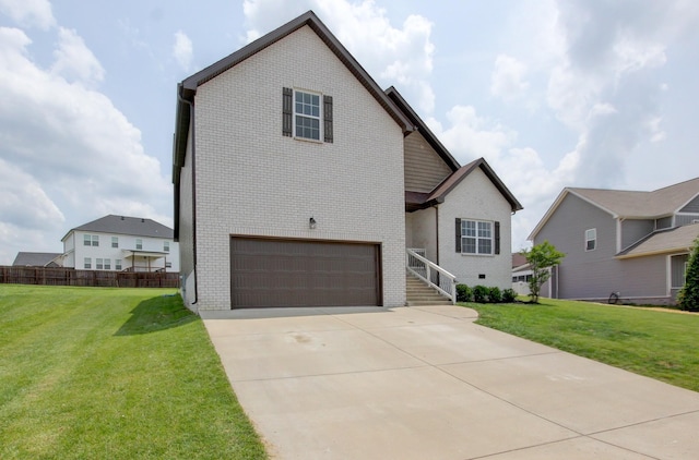 1331 Juniper Pass, Clarksville, TN 37043 - traditional-style home featuring brick siding, an attached garage, and a front lawn