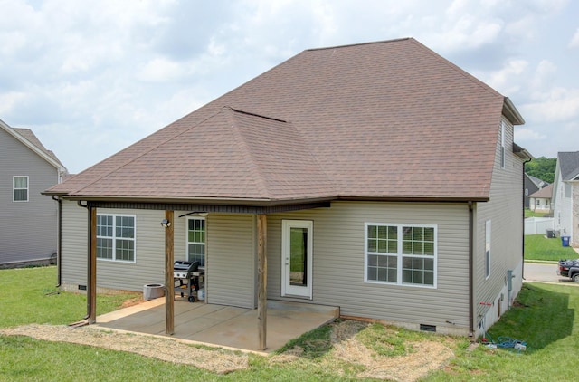 1331 Juniper Pass, Clarksville, TN 37043 - rear view of property with crawl space, a shingled roof, a lawn, and a patio