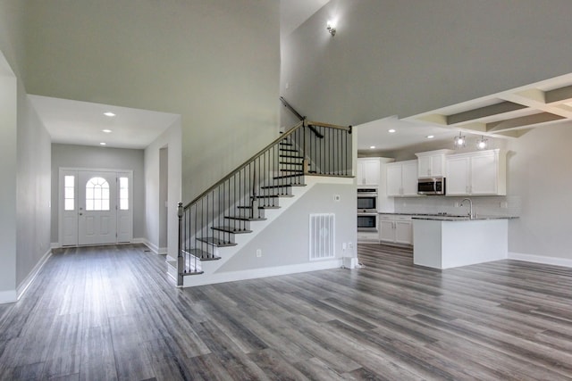 1331 Juniper Pass, Clarksville, TN 37043 - foyer entrance with a high ceiling, stairway, dark wood-style flooring, and recessed lighting