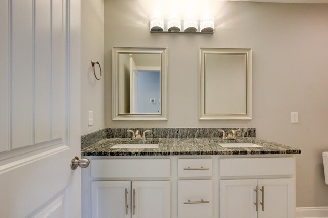 1331 Juniper Pass, Clarksville, TN 37043 - bathroom with double vanity and toilet