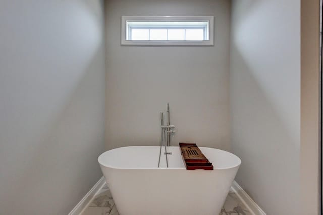 1331 Juniper Pass, Clarksville, TN 37043 - full bathroom featuring marble finish floors and a freestanding bath