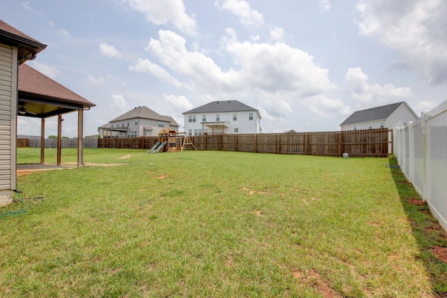 1331 Juniper Pass, Clarksville, TN 37043 - fenced backyard featuring a playground and a ceiling fan