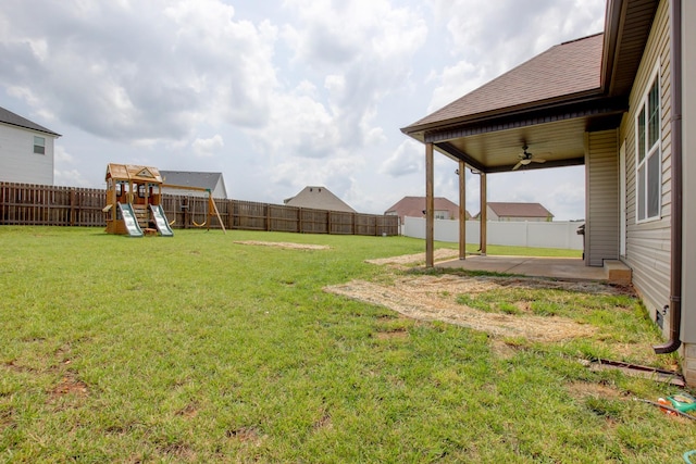 1331 Juniper Pass, Clarksville, TN 37043 - fenced backyard with ceiling fan, a playground, and a patio