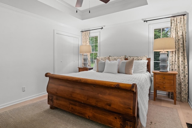 5191 Still House Hollow Rd, Franklin, TN 37064 - bedroom featuring multiple windows, ornamental molding, a raised ceiling, and ceiling fan