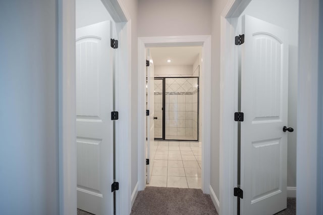 135 Bruce Meadows Dr, Beechgrove, TN 37018 - hallway with light tile patterned flooring and light colored carpet