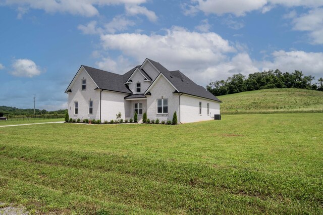 135 Bruce Meadows Dr, Beechgrove, TN 37018 - view of front facade featuring a front lawn and brick siding