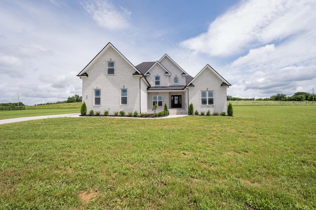 135 Bruce Meadows Dr, Beechgrove, TN 37018 - traditional-style house featuring a front yard and brick siding