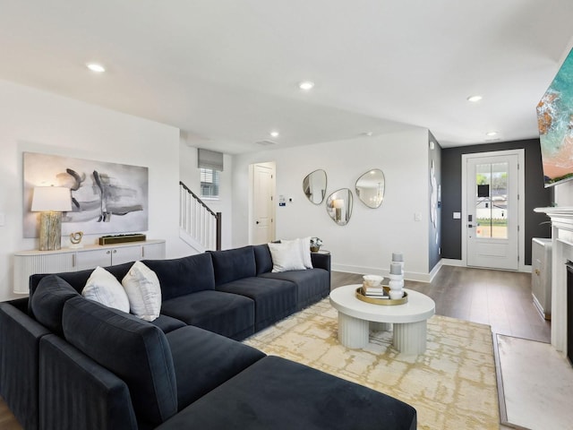 7019 Chardon St, Franklin, TN 37067 - living area featuring wood finished floors, stairs, and recessed lighting