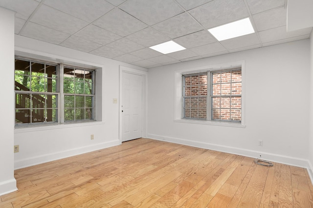2411 Woolson Rd, Chattanooga, TN 37406 - unfurnished room with light wood finished floors and a drop ceiling
