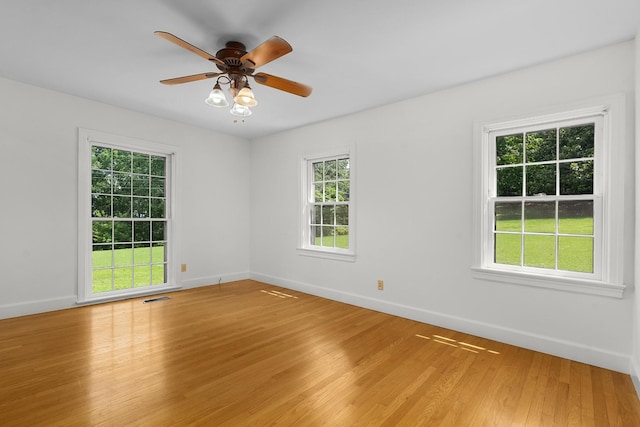 2411 Woolson Rd, Chattanooga, TN 37406 - unfurnished room with light wood finished floors and a ceiling fan