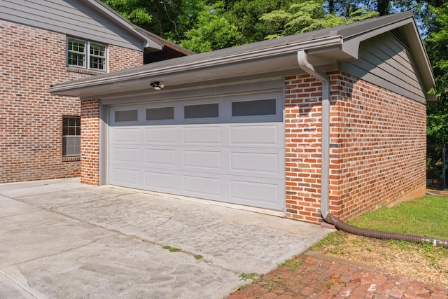 2411 Woolson Rd, Chattanooga, TN 37406 - garage featuring concrete driveway