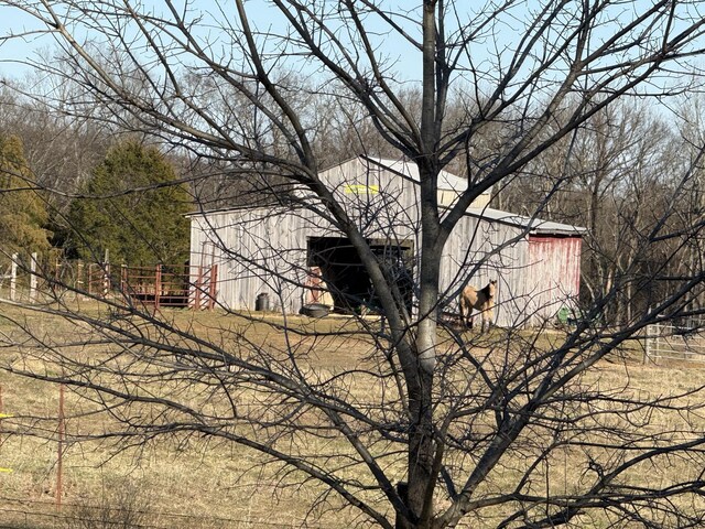 3330 Booker Farm Rd, Mount Pleasant, TN 38474 - view of home's exterior featuring a barn and an outbuilding
