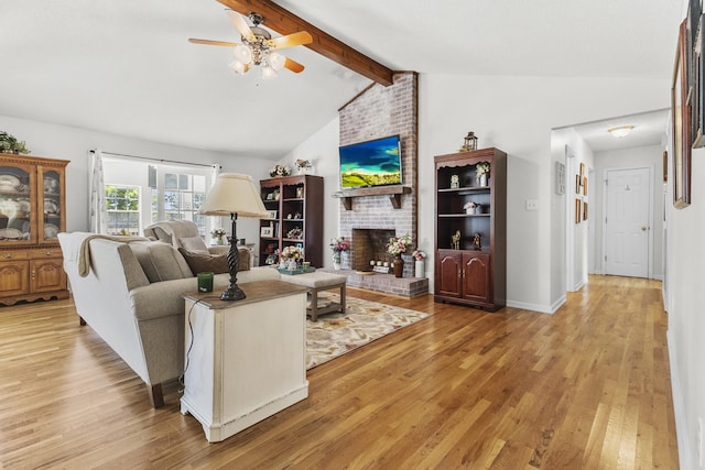 3330 Booker Farm Rd, Mount Pleasant, TN 38474 - living room with ceiling fan, light wood-style floors, and a brick fireplace