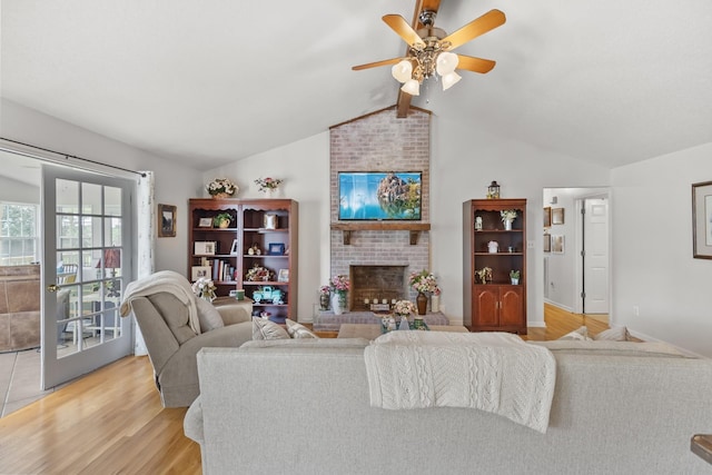 3330 Booker Farm Rd, Mount Pleasant, TN 38474 - living area featuring a fireplace, light wood-style floors, and ceiling fan
