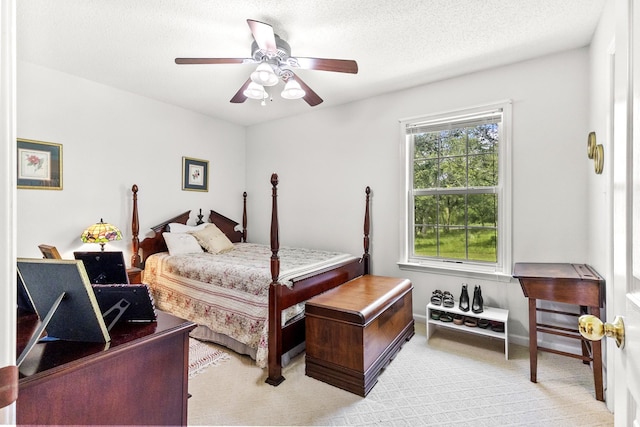 3330 Booker Farm Rd, Mount Pleasant, TN 38474 - bedroom featuring light carpet, ceiling fan, and a textured ceiling