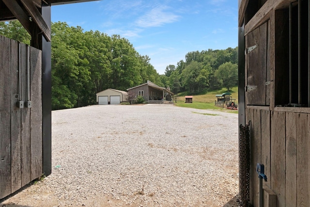 189 Cross Creek Dr, Manchester, TN 37355 - view of yard with a garage and an outbuilding