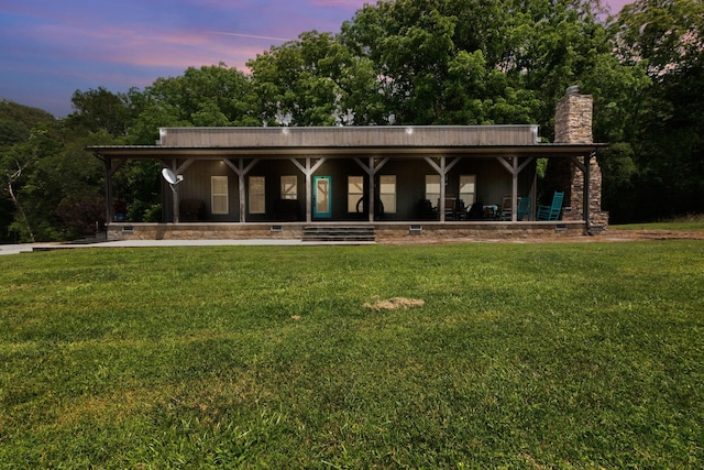 189 Cross Creek Dr, Manchester, TN 37355 - view of front of home with a chimney, a yard, and a porch