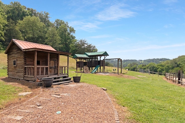 189 Cross Creek Dr, Manchester, TN 37355 - view of yard with a playground and a wooded view