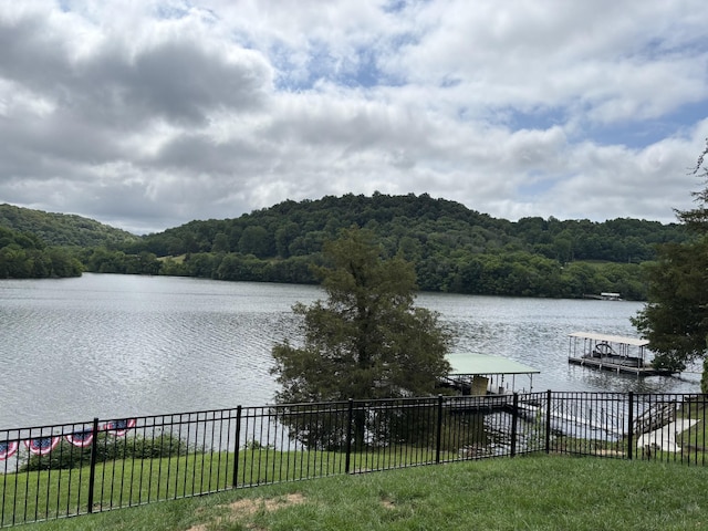 189 Cross Creek Dr, Manchester, TN 37355 - water view with a heavily wooded area and a boat dock